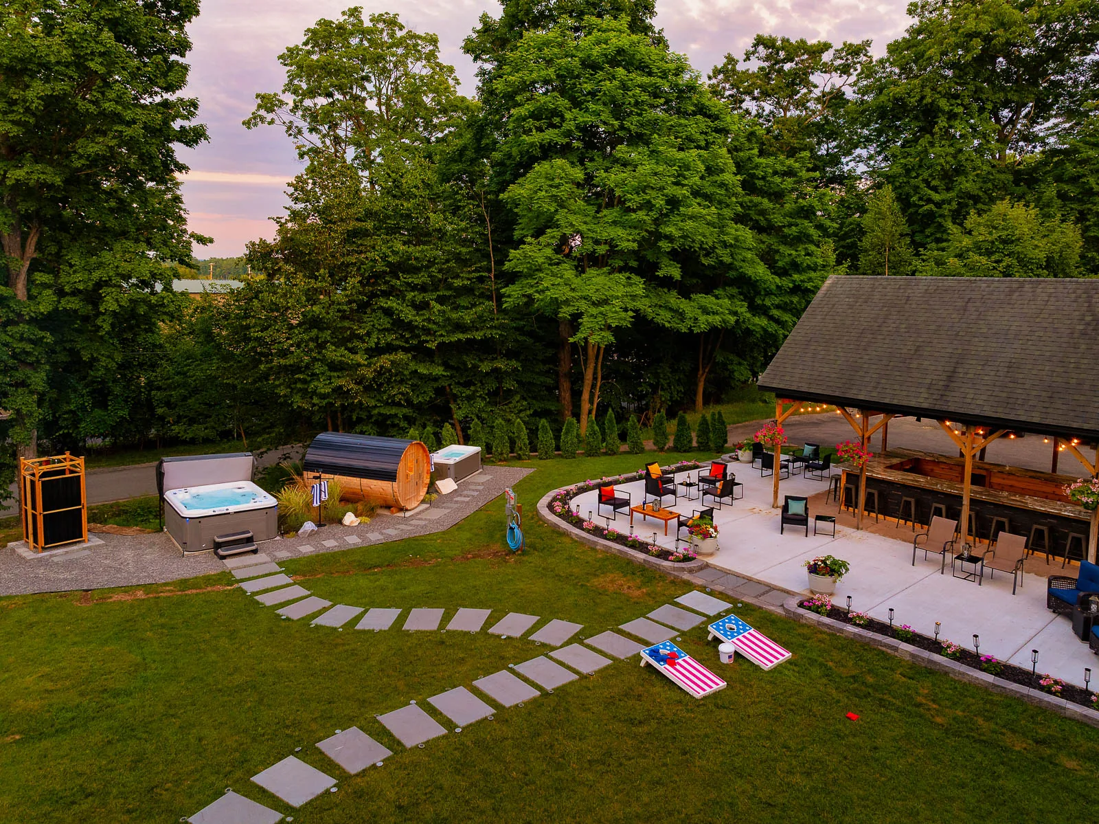 Aerial view of the pavilion, wellness area, and lawn amenities