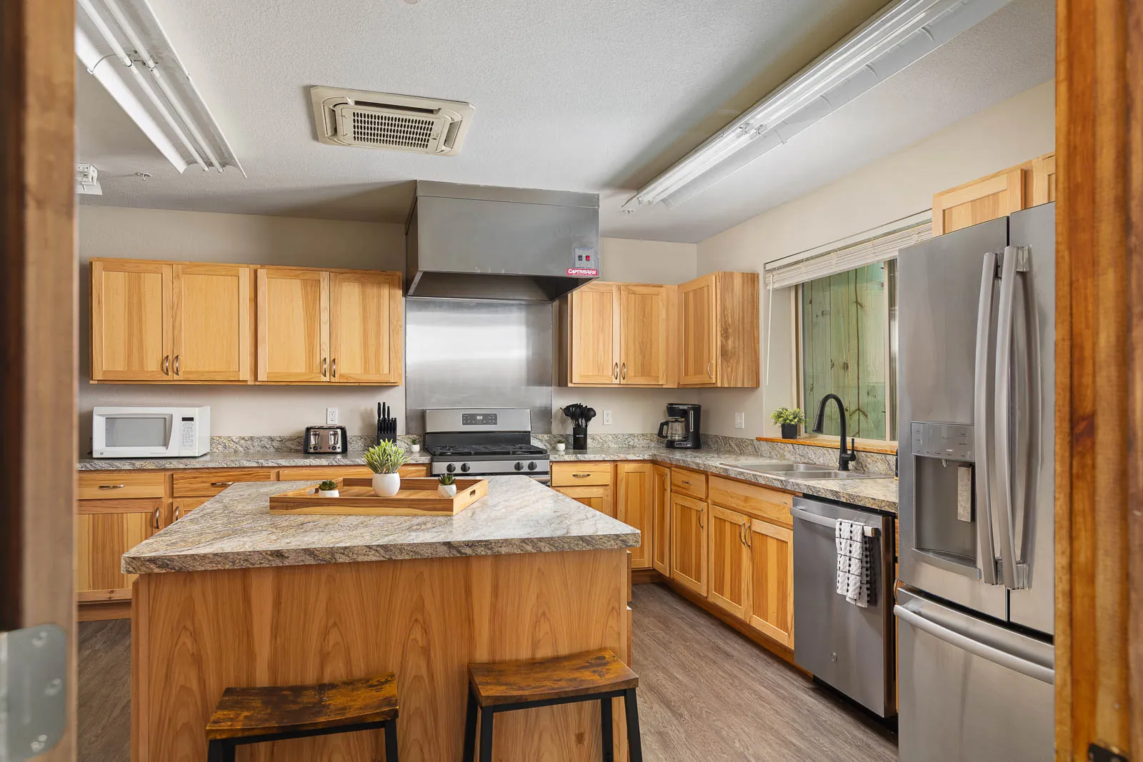 Kitchen island with stainless appliances