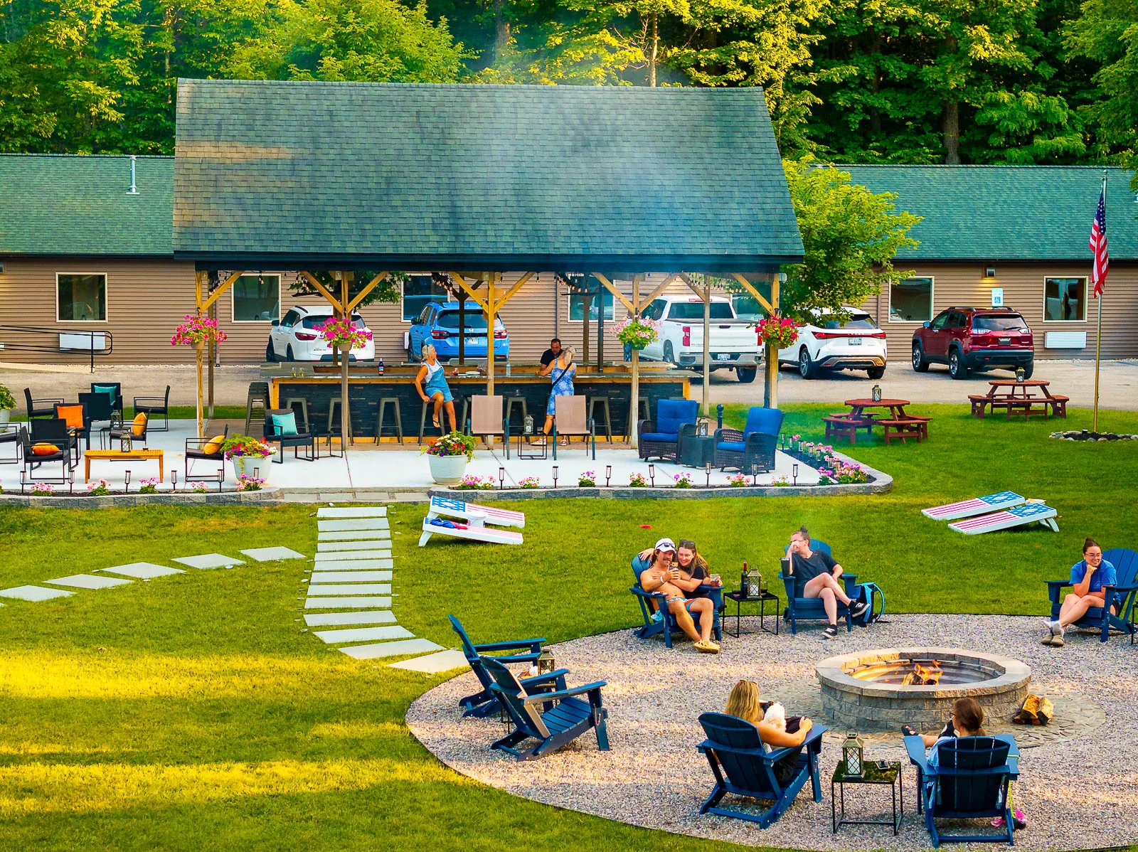 The Sandbar Lodge pavilion, lawn, and firepit area