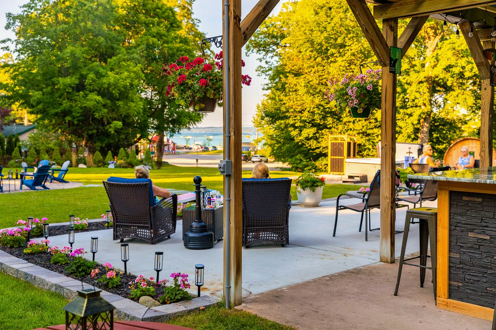 Outdoor pavilion with lake view and seating