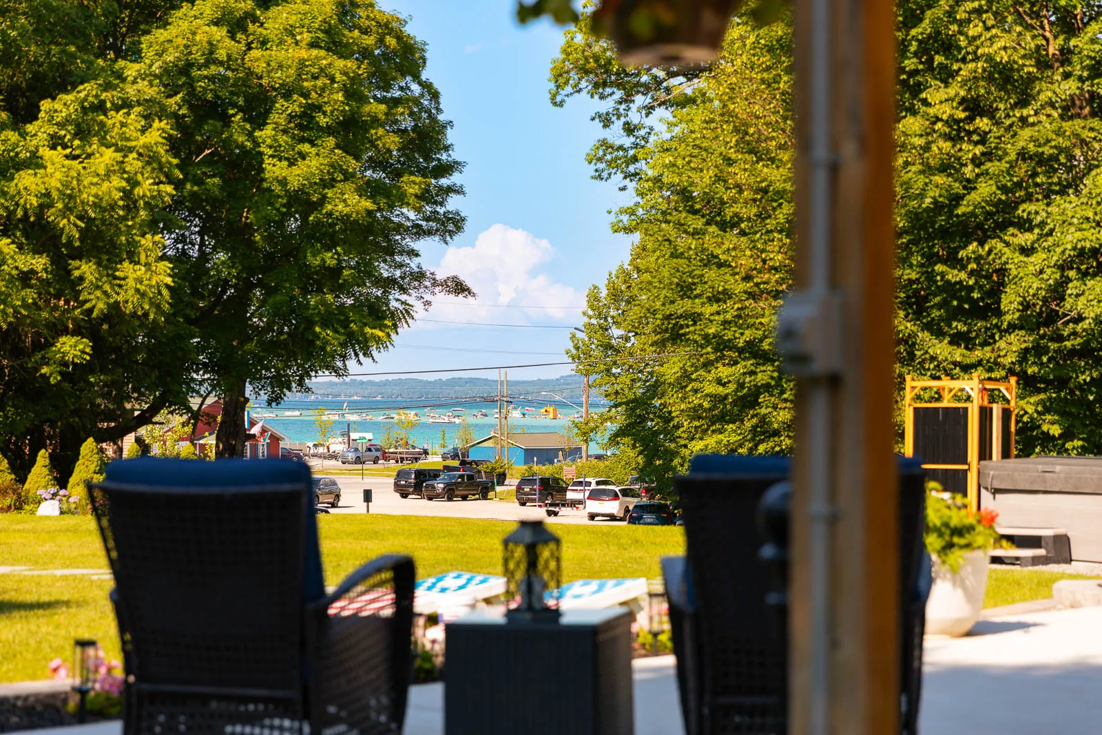 Pavilion seating with Torch Lake beyond the lawn
