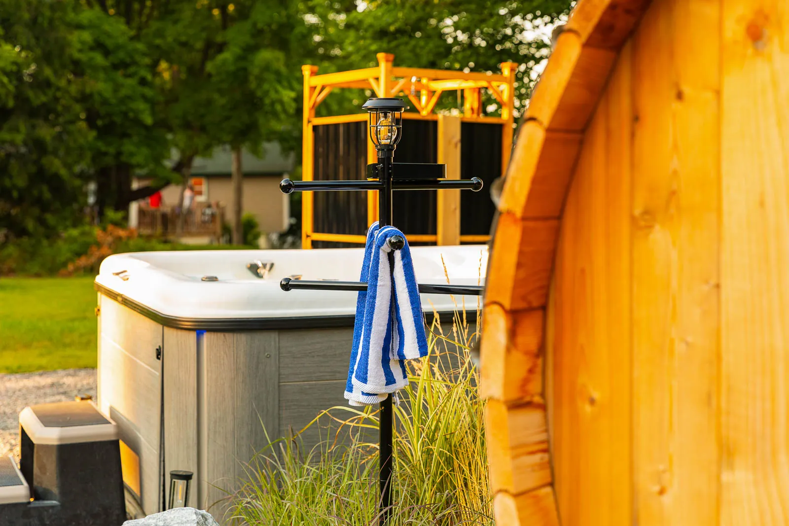 Hot tub and barrel sauna with fresh towels