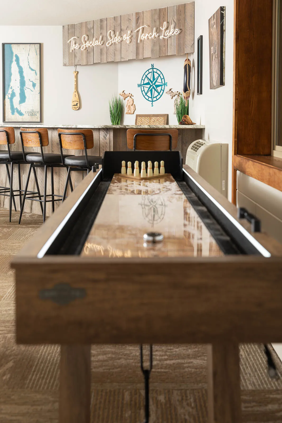Shuffleboard table facing the lounge bar