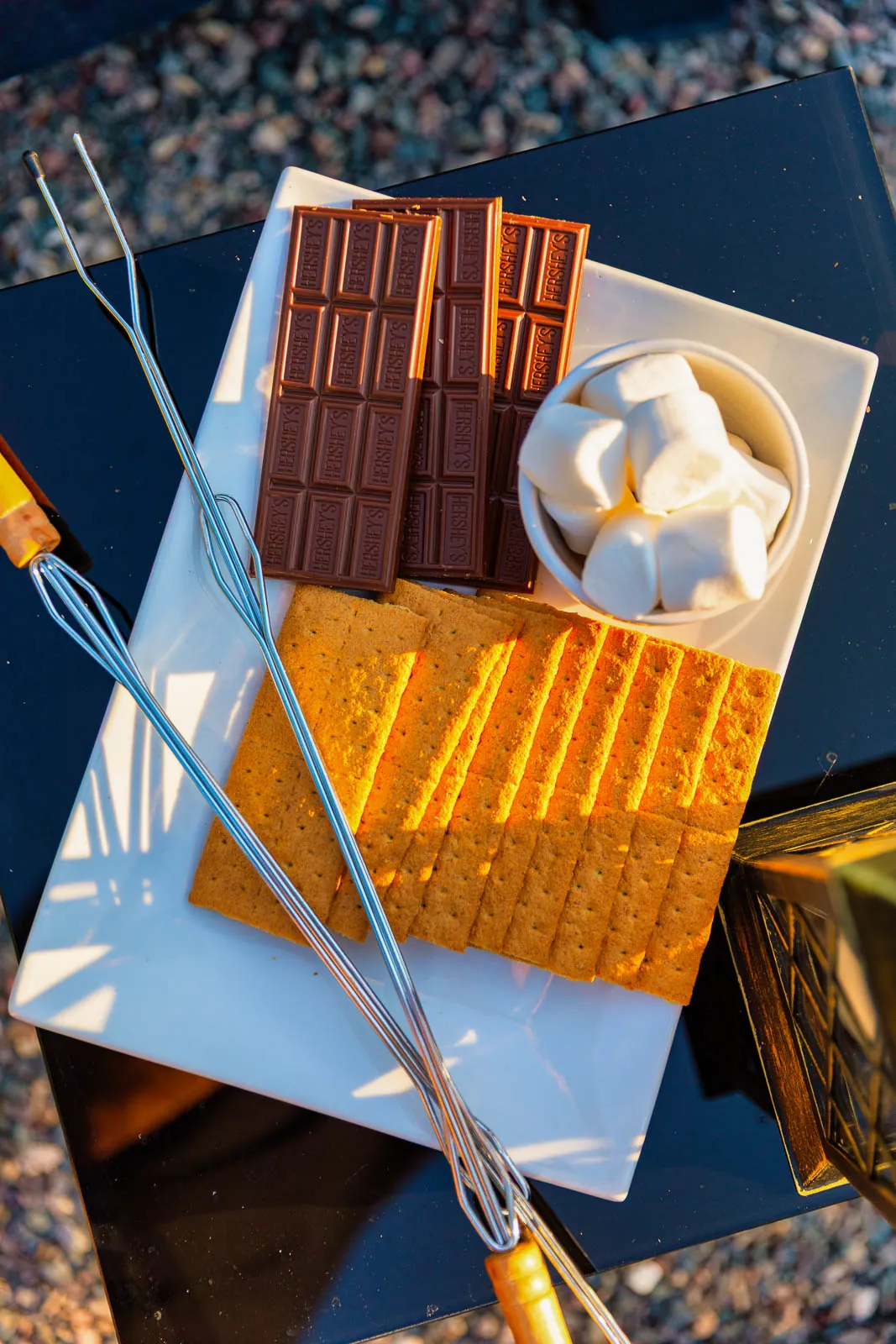 Smores tray with chocolate, marshmallows, and graham crackers