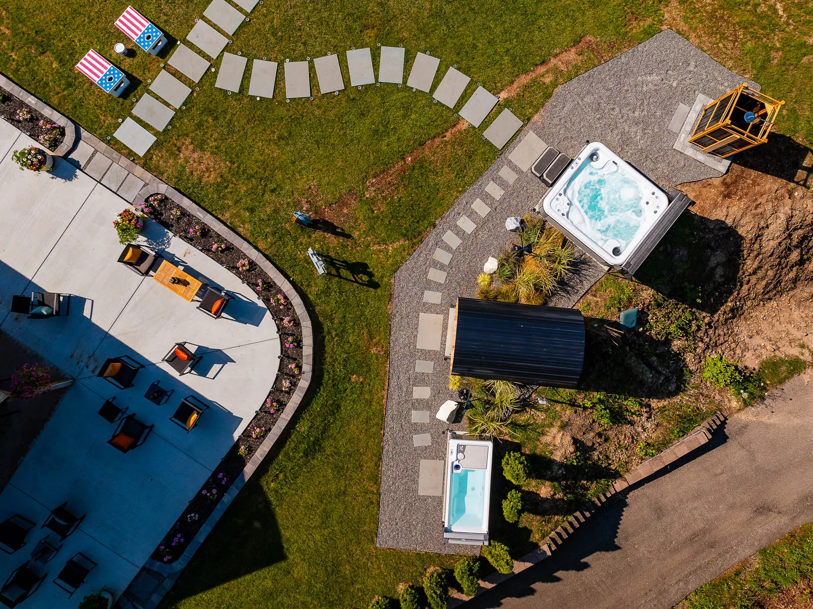 Overhead view of hot tub, sauna, cold plunge, and path