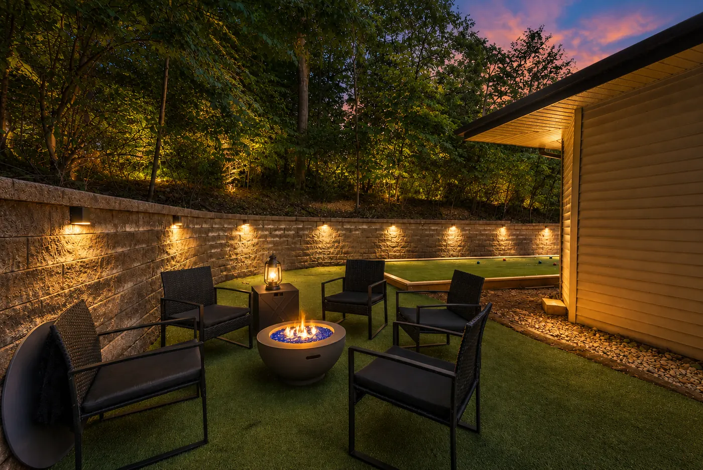 Bocce and firepit lounge at twilight