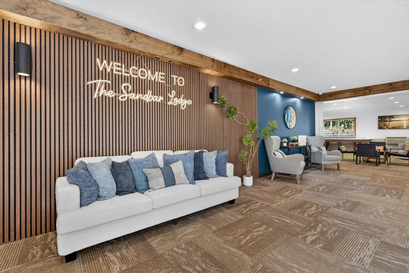 Sandbar Lodge lobby lounge with sofa and seating
