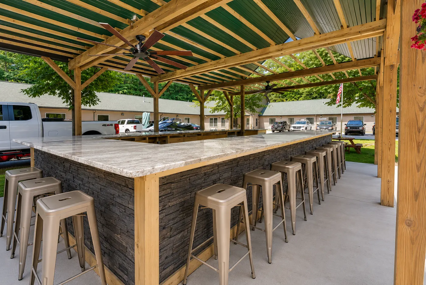 Covered pavilion bar with stools