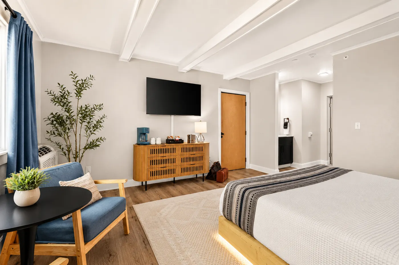 King lodge suite seating area, TV, and coffee station