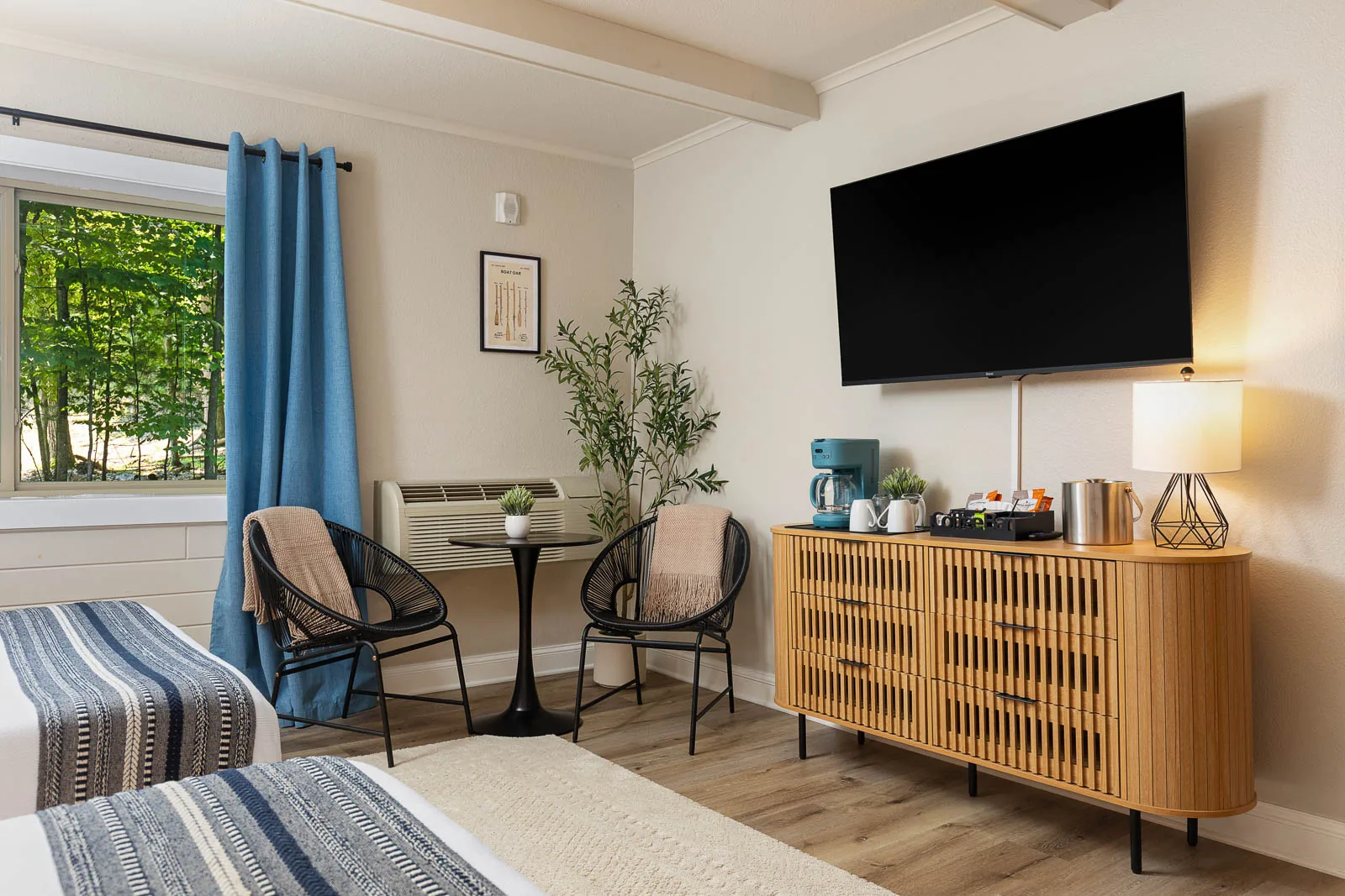 Two Queens Lodge Suite with Smart TV, coffee station, and seating